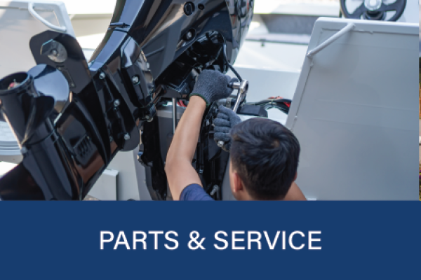 Slide image featuring a marine technician fixing an outboard motor at Wye Heritage Marine Resort